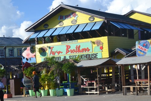 A must stop is at DA Fish Fry! It is located just a few minutes outside of down town Nassau in between there and Cable Beach. This is a great spot to try some local food, like the famous Conch Salad and Conch Fritters.