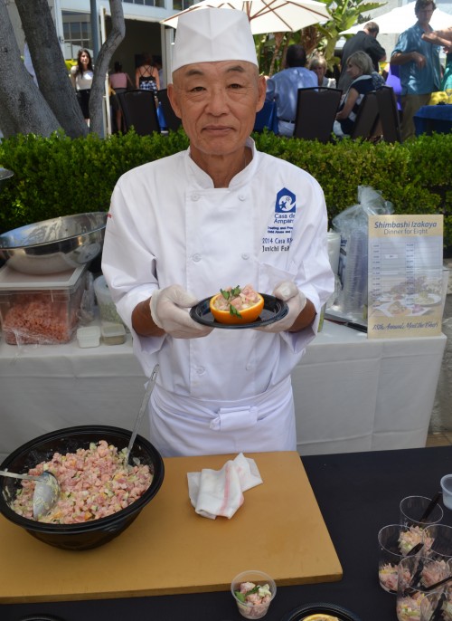 Chef Junichi Fukushima of, Shimbashi Izakaya serving a Orange and Seafood Salad