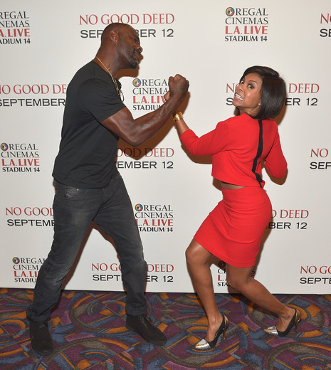 Idris Elba and Taraji P. Henson have fun while promoting new film "No Good Deed." (Photo by Charley Gallay/Getty Images for Screen Gems)