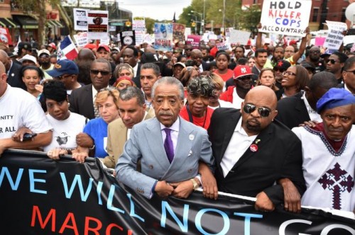 The Reverend Al Sharpton marches with over 2500 peaceful protesters at a rally against police brutality in memory of Eric Garner August 23, 2014 in Staten Island, New York City.   STAN HONDA/AFP/GETTY IMAGES