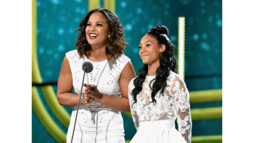 Mo'Ne Davis  and Laila Ali on stage to present an award at the Soul Train Awards.