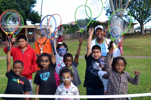  Frances Simpson-Lang, President of the Mountain View Sports and Raquet Association in San Diego, CA with Junior Tennis Players