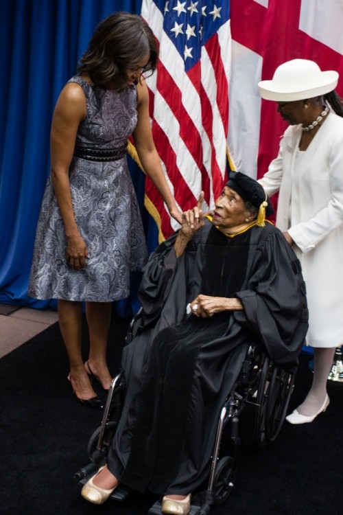First Lady Michelle Obama greets alum and Selma civil rights leader, Dr. Amelia Boynton Robinson, age 103 and Latifya Mohammed before the Tuskegee University Commencement ceremony in Tuskegee, Ala., May 9, 2015. (Official White House Photo by Chuck Kennedy)