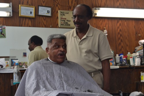 Barber Walter Hopkins still enjoys cutting hair and good conversation.