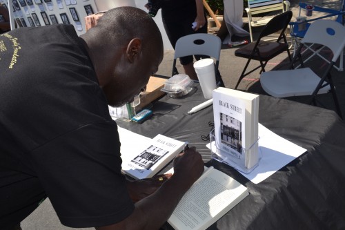 Sidney Cooper, Jr., of Cooper Family Foundation was  at the event signing copies of his debut novel, "Black Street"