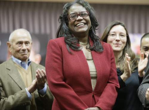 Los Angeles Unified School District Deputy Superintendent Michelle King is named the district's next superintendent by members of the board of education during a news conference in Los Angeles, Monday, Jan. 11, 2016. At left, former Los Angeles Unified School District Superintendent Ramon Cortines. (AP Photo/Damian Dovarganes)