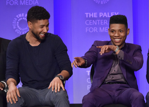 Jussie Smollett (Jamal Lyon) and Bryshere Y. Gray (Hakeem Lyon) share a playful moment on stage at PaleyFest.