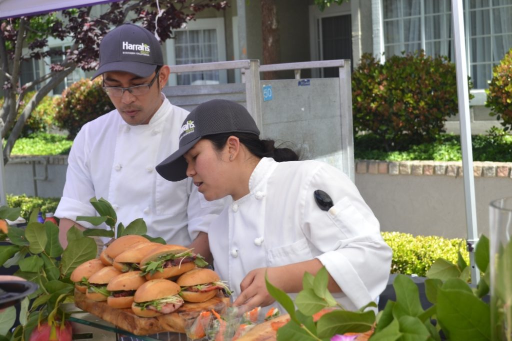 Chef Israel Ortiz and staff member of Harrahs getting prepared to serve guests.