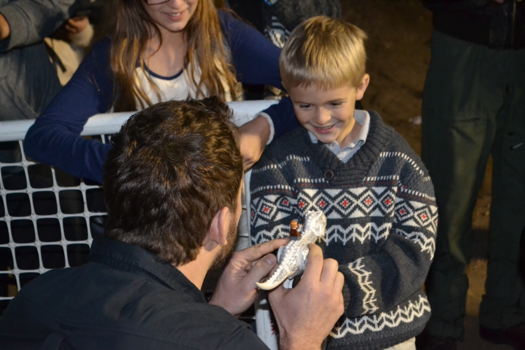Pratt enjoys chatting with young fan about toys. Photo credit: Gwen Pierce